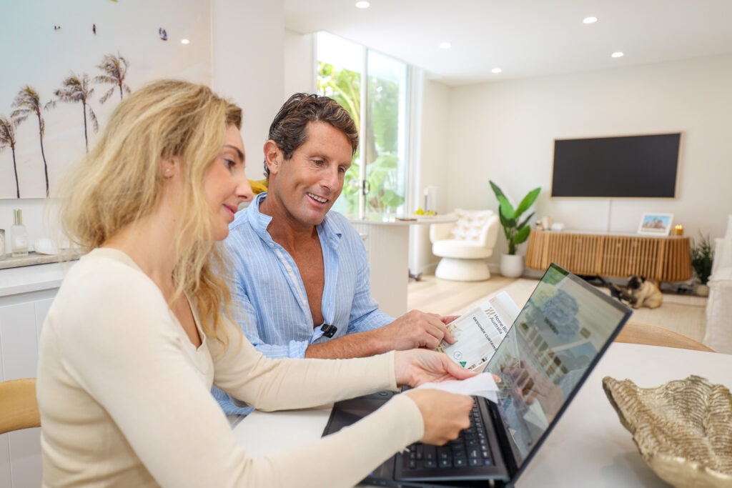 Harries from Bondi Reviewing custom window furnishing samples at home - Home Blinds Australia Bondi Rescue Harries Home blinds Australia